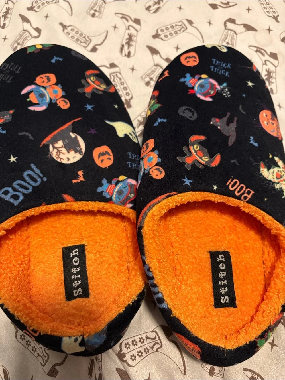 Stitch Halloween and Cma footies! Like new, one size. Will not sell separate.